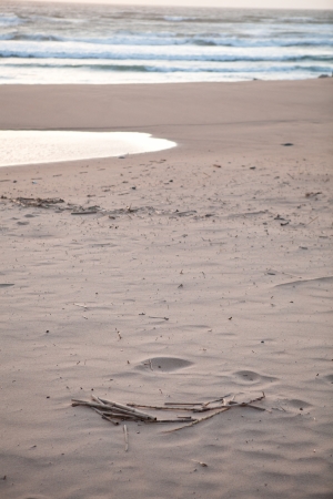 Calm and serene beach scene in late eveningの写真素材