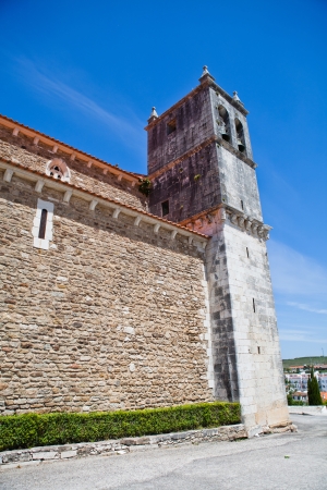Belltower of Igreja de Santa Maria do Castelo or Church of Santa Maria in Lourinha in Lisbon district of Portugalの写真素材