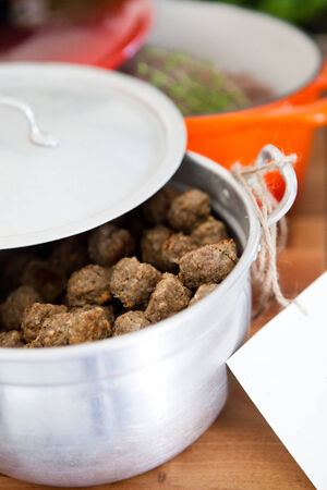 Closeup of pot of freshly prepared meat balls ready to serve at dinner partyの写真素材