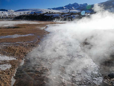 Geyser del Tatio, Atacama Desert, Chile: Geyser in the morning erupting activity in the Geysers del Tatio field in the Atacama Desert, Chile.の写真素材
