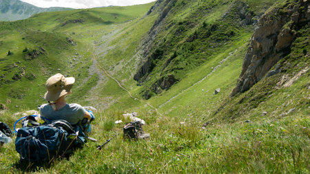 mountain view of the peaks of the Balkan. high mountains, blue skys. person in the middleの写真素材