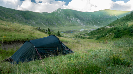 wild camping in the mountains. peaks of the Balkan. high mountains, blue skysの写真素材
