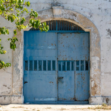 old window with an arch in a prissonの写真素材