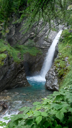 france Waterfall with long exposure and blurred water flow in Ecrins national parkの写真素材