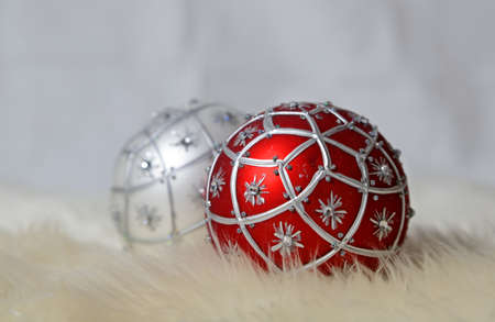 Red and silver Christmas balls with white backgroundの写真素材