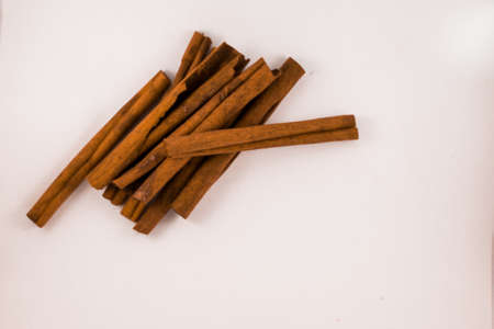 Cinnamon sticks on white backgroundの写真素材