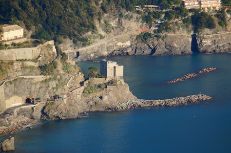 Monterosso, view of the tower over the seaの写真素材