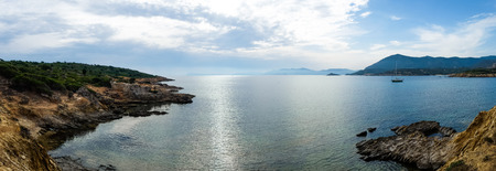 Panorama of South coast of Sardinia from PiscinÃ¬ beach with fogの写真素材