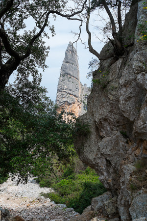 Aguglia rock pinnacle in goloritze beach, Baunei, Sardinia, Italyの写真素材