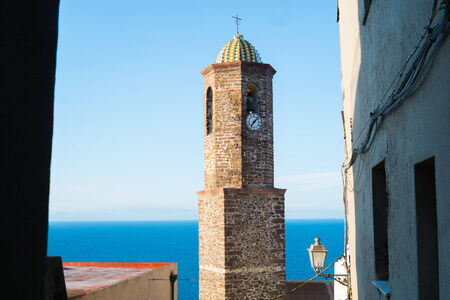 Sant Antonio abate church bell tower in Castelsardo, Sardinia, Italy