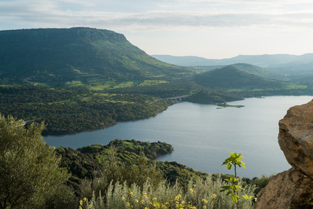 View over the lake from Rocca Doria, a rock in Monteleone Rocca Doria, Sardinia, Italyの写真素材