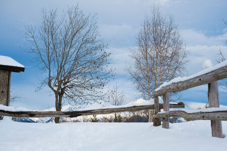 House on Alps montains in winter on the way to Grigna, Lecco, Italyの写真素材