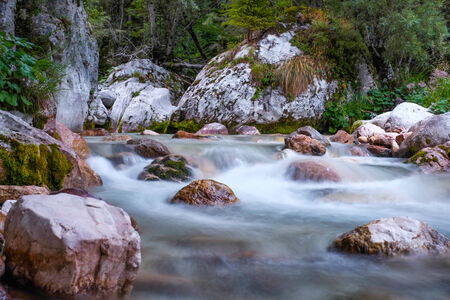 Mountain river and waterfall in Sloveniaの写真素材