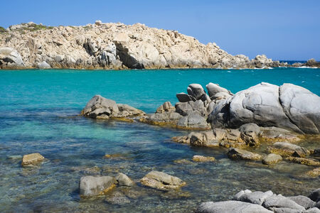 Blue sea with rocks in Cala Cipolla, Chia, Sardiniaの写真素材