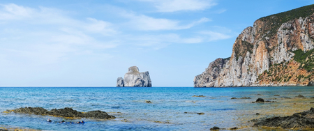 Pan di zucchero island from Masua beach on the west coast of Sardinia, Italyの写真素材