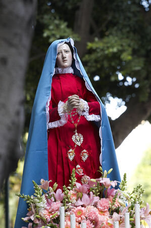 Mother Mary statue in a catholic procession in Cagliari, Sardinia, Italy
