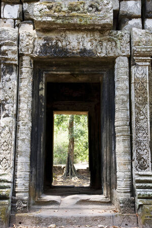 Door to a temple in Angkor, Siem Reap, Cambodiaの写真素材