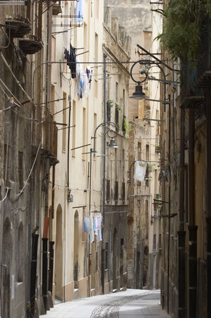 Narrow street in Old Town in Cagliari, Sardinia, Italyの写真素材