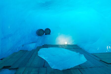 Barrel inside the ice cave on Furka Pass, Alps mountains, Valais, Switzerlandの写真素材