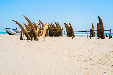 Typical fishing boat Caballitos on the beach of Pimentel, Chiclayo, Peruの写真素材