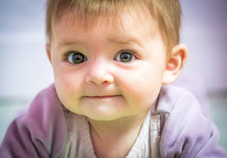 Portrait of baby girl six months oldの写真素材