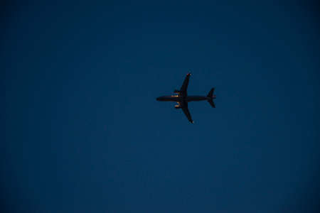 A plane flying at night