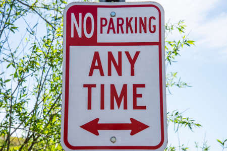 No parking time sign on the road. Road sign on the street.の写真素材