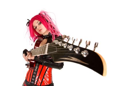Gothic girl with guitar, focus on face, isolated on white background   の写真素材
