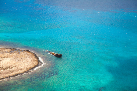 Old pirate ship in beautiful bay near Gramvousa island, Crete, Greece の写真素材