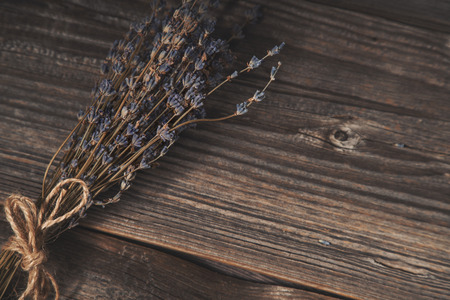 Dried lavender on wooden background, artistic shotの写真素材