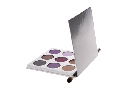 Trendy eye shadow palette in purple colors, isolated on white background の写真素材