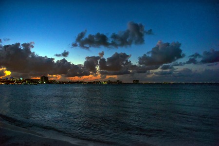 Sunset on the Caribbean Sea. Buildings in the distanceの写真素材