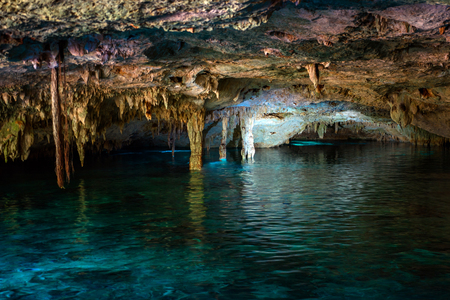 Cenote Dos Ojos with clear blue waterの写真素材