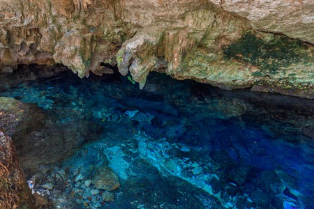 Cenote Dos Ojos with clear blue water in the caveの写真素材