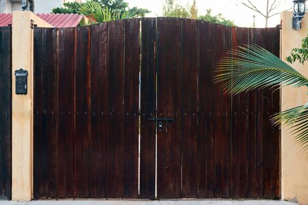 The texture of dark wood planks vertical