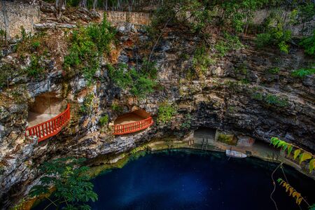 Cenote Ecoturistico X-cajum with blue clear waterの写真素材