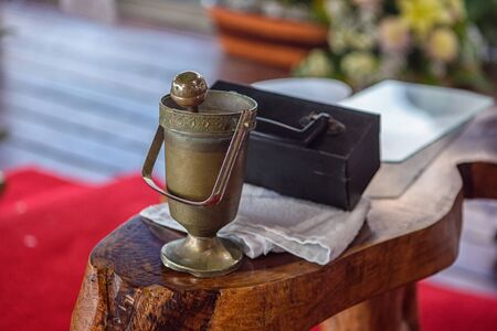 small bronze bowl in the Catholic Church.の写真素材