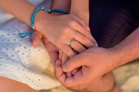 Man and woman newlyweds hold hands.の写真素材