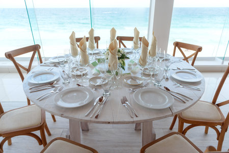 elegant banquet tables prepared for a conference or a party indoors