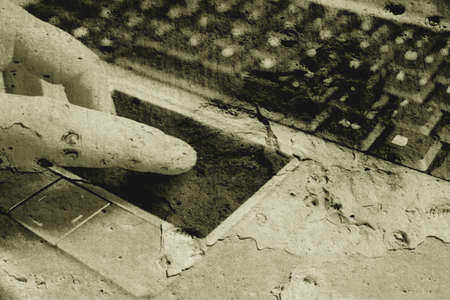 Touchpad on a grungy backgroundの写真素材