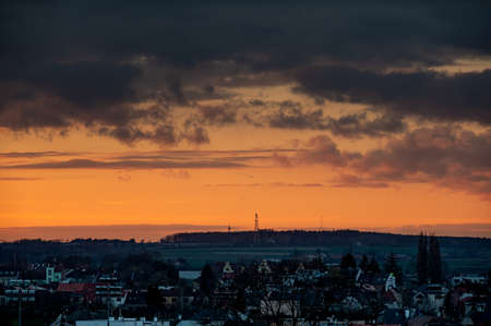 Beautiful sundawn twilight over the city. Horizont, sky with clouds.の写真素材