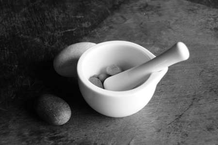 Still life of porcelain mortar monochromatic.の写真素材