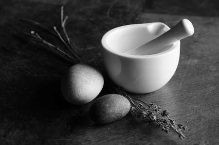 Still life of porcelain mortar monochromatic.