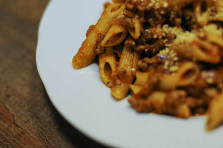 Tasty pasta bowl with parmesan.の写真素材
