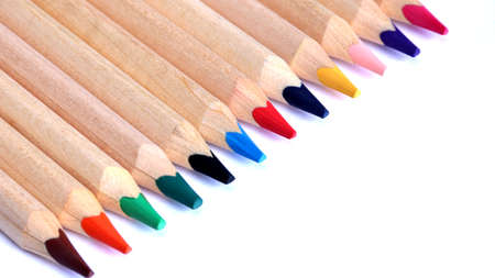 Colored pencils on a white background close up in macro photography. Art set of pencils with free space.の写真素材