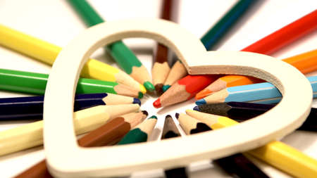 Colored pencils on a white background close up in macro photography. Art set of pencils with free space.の写真素材