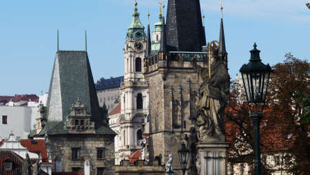 Prague, Czech Republic. Charles Bridge (Karluv Most) with its statuette and Old Town Tower. Lesser...