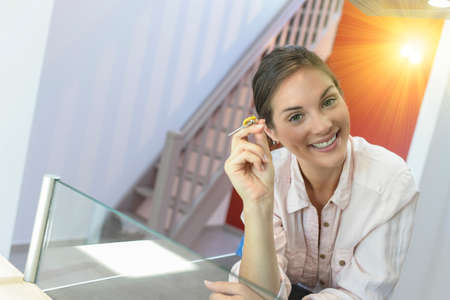 Portrait of a cute young ladie in his new homeの写真素材