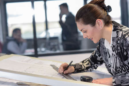 Enthusiastic female designer loves her jobの写真素材
