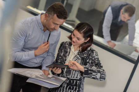 Happy male engineer and female supervisor showing and ok and thumbs up sigh